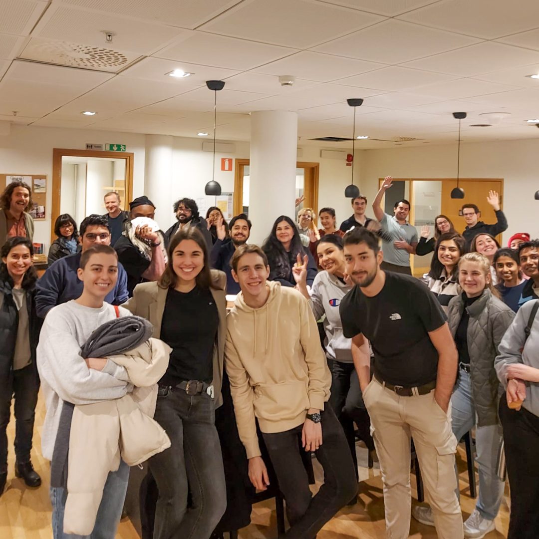 a large group of sfi students smiling at the camera