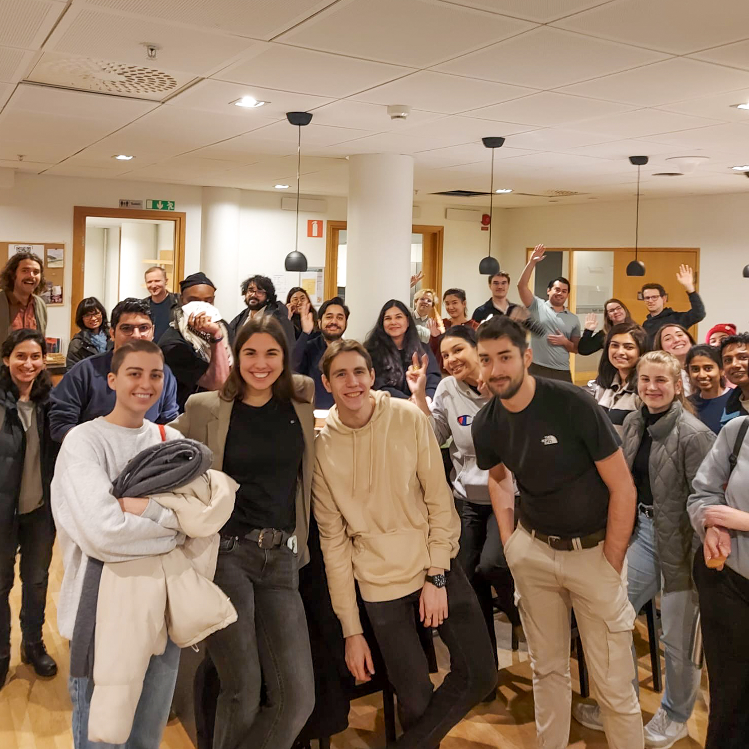 a large group of sfi students smiling at the camera